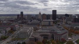 5.7K aerial stock footage of flying by the city skyline before descending toward street, Downtown Saint Paul, Minnesota Aerial Stock Footage | DX0001_002433
