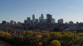5.7K aerial stock footage ascending with view of city skyline, Downtown Minneapolis, Minnesota Aerial Stock Footage | DX0001_002452