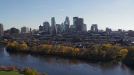 5.7K aerial stock footage approach and flyby the city skyline, seen from Mississippi River, Downtown Minneapolis, Minnesota Aerial Stock Footage | DX0001_002454
