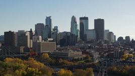 5.7K aerial stock footage focus on skyscrapers while ascending by the city skyline, Downtown Minneapolis, Minnesota Aerial Stock Footage | DX0001_002472