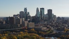 5.7K aerial stock footage focus on tall skyscrapers while flying by the city skyline, Downtown Minneapolis, Minnesota Aerial Stock Footage | DX0001_002475