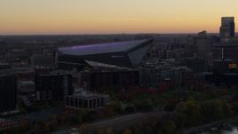 5.7K aerial stock footage of flying by US Bank Stadium at sunset, Downtown Minneapolis, Minnesota Aerial Stock Footage | DX0001_002544