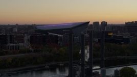 5.7K aerial stock footage flyby power plant with view of US Bank Stadium across the river at sunset, Downtown Minneapolis, Minnesota Aerial Stock Footage | DX0001_002546