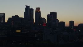 5.7K aerial stock footage slowly flying by the city skyline at twilight, Downtown Minneapolis, Minnesota Aerial Stock Footage | DX0001_002560