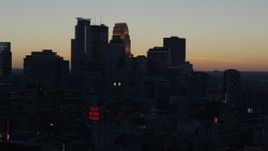 5.7K aerial stock footage slowly passing by the city skyline at twilight, Downtown Minneapolis, Minnesota Aerial Stock Footage | DX0001_002561
