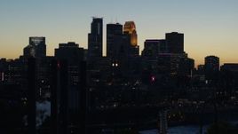 5.7K aerial stock footage flyby the skyscrapers in the city skyline at twilight, Downtown Minneapolis, Minnesota Aerial Stock Footage | DX0001_002575