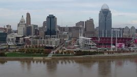 5.7K aerial stock footage approach city skyline and baseball stadium from Ohio River, Downtown Cincinnati, Ohio Aerial Stock Footage | DX0001_002594