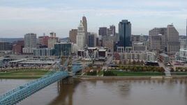 5.7K aerial stock footage approach city skyline and bridge spanning Ohio River, Downtown Cincinnati, Ohio Aerial Stock Footage | DX0001_002601