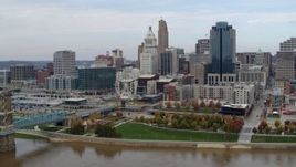 5.7K aerial stock footage ascend and approach city skyline from the Ohio River, Downtown Cincinnati, Ohio Aerial Stock Footage | DX0001_002605