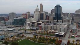 5.7K aerial stock footage flyby Ferris wheel and apartment building near skyscrapers, Downtown Cincinnati, Ohio Aerial Stock Footage | DX0001_002606