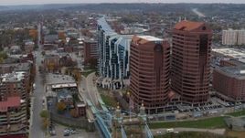 5.7K aerial stock footage flying by modern condominium complex and two riverfront office buildings in Covington, Kentucky Aerial Stock Footage | DX0001_002622