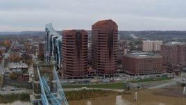 5.7K aerial stock footage reverse view of two riverfront office buildings and bridge in Covington, Kentucky Aerial Stock Footage | DX0001_002624