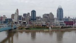 5.7K aerial stock footage of the city's downtown skyline across the Ohio River, Downtown Cincinnati, Ohio Aerial Stock Footage | DX0001_002645