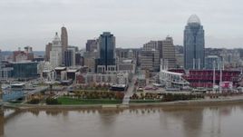 5.7K aerial stock footage flyby the city's downtown skyline and baseball stadium by the Ohio River, Downtown Cincinnati, Ohio Aerial Stock Footage | DX0001_002648