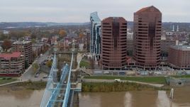 5.7K aerial stock footage flyby bridge and office buildings, reveal riverfront condo complex in Covington, Kentucky Aerial Stock Footage | DX0001_002657