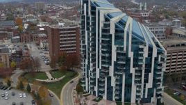 5.7K aerial stock footage approach modern condo complex in Covington, Kentucky Aerial Stock Footage | DX0001_002662