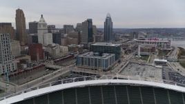 5.7K aerial stock footage of apartment and office buildings near skyscrapers seen from the football stadium in Downtown Cincinnati, Ohio Aerial Stock Footage | DX0001_002680