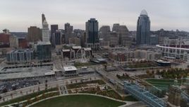 5.7K aerial stock footage descend with view of city's skyline from the Ohio River in Downtown Cincinnati, Ohio Aerial Stock Footage | DX0001_002686