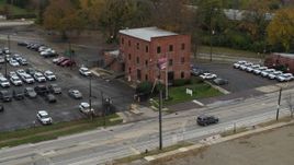 5.7K aerial stock footage of an orbit around a small brick police station in Columbus, Ohio Aerial Stock Footage | DX0001_002712