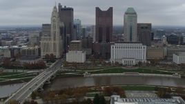 5.7K aerial stock footage flyby the city's skyline and river near Discovery Bridge, Downtown Columbus, Ohio Aerial Stock Footage | DX0001_002730