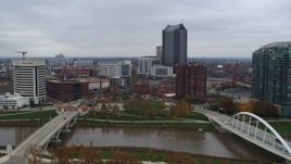 5.7K aerial stock footage flyby city park by the Scioto River, with courthouse in background, Downtown Columbus, Ohio Aerial Stock Footage | DX0001_002733