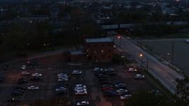 5.7K aerial stock footage of orbiting a brick police station at twilight in Columbus, Ohio Aerial Stock Footage | DX0001_002761