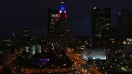 5.7K aerial stock footage of flying away from LeVeque Tower at night, Downtown Columbus, Ohio Aerial Stock Footage | DX0001_002796