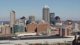 5.7K aerial stock footage of flying by the city's skyline in Downtown Indianapolis, Indiana Aerial Stock Footage | DX0001_002816