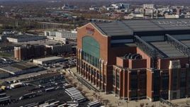 5.7K aerial stock footage flying by the front of a football stadium in Indianapolis, Indiana Aerial Stock Footage | DX0001_002831