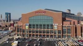5.7K aerial stock footage of the front of a football stadium in Indianapolis, Indiana Aerial Stock Footage | DX0001_002834
