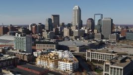 5.7K aerial stock footage descend while focusing on the city's skyline in Downtown Indianapolis, Indiana Aerial Stock Footage | DX0001_002843