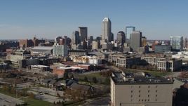 5.7K aerial stock footage descend and then approach the city's skyline in Downtown Indianapolis, Indiana Aerial Stock Footage | DX0001_002848