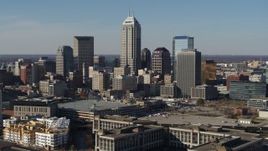 5.7K aerial stock footage of a reverse view of tall skyscrapers in the city's skyline in Downtown Indianapolis, Indiana Aerial Stock Footage | DX0001_002857