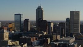 5.7K aerial stock footage reverse view of Salesforce Tower skyscraper and skyline of Downtown Indianapolis, Indiana Aerial Stock Footage | DX0001_002877