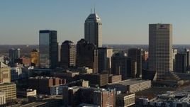 5.7K aerial stock footage of approaching by the skyline of Downtown Indianapolis, Indiana Aerial Stock Footage | DX0001_002879
