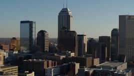 5.7K aerial stock footage of flying by Salesforce Tower and the skyline of Downtown Indianapolis, Indiana Aerial Stock Footage | DX0001_002880