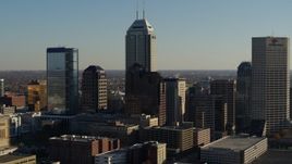 5.7K aerial stock footage flyby skyscrapers in the skyline of Downtown Indianapolis, Indiana before ascent and approach Aerial Stock Footage | DX0001_002884