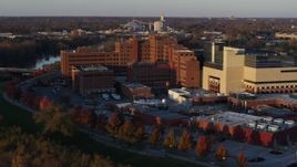 5.7K aerial stock footage approach and orbit a VA hospital complex at sunset in Indianapolis, Indiana Aerial Stock Footage | DX0001_002919