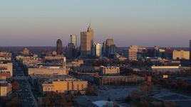 5.7K aerial stock footage of a wide view of the city's downtown skyline at sunset, Downtown Indianapolis, Indiana Aerial Stock Footage | DX0001_002933