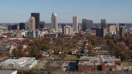 5.7K aerial stock footage of slowly flying away from and by the city's skyline, seen from apartment buildings, Downtown Louisville, Kentucky Aerial Stock Footage | DX0001_002982