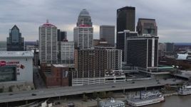 5.7K aerial stock footage reverse view of hotel and skyline, revealing the river in Downtown Louisville, Kentucky Aerial Stock Footage | DX0001_003037