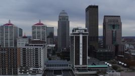5.7K aerial stock footage fly away from skyscrapers behind riverfront hotel in Downtown Louisville, Kentucky Aerial Stock Footage | DX0001_003052