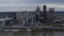 5.7K aerial stock footage slowly fly away from riverfront buildings and skyline in Downtown Louisville, Kentucky Aerial Stock Footage | DX0001_003053