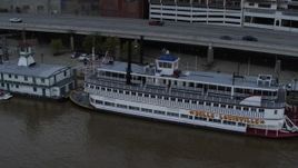 5.7K aerial stock footage close-up view of the historic riverboat docked by Downtown Louisville, Kentucky Aerial Stock Footage | DX0001_003064