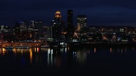 5.7K aerial stock footage slowly flying past the city skyline at twilight, seen from the river, Downtown Louisville, Kentucky Aerial Stock Footage | DX0001_003120