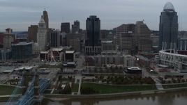 5.7K aerial stock footage slow approach to city skyline and Scripps Center from the Ohio River, Downtown Cincinnati, Ohio Aerial Stock Footage | DX0001_003146