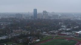 5.7K aerial stock footage slowly flying by the city skyline seen from residential neighborhoods, Downtown Lexington, Kentucky Aerial Stock Footage | DX0001_003208