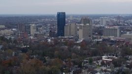 5.7K aerial stock footage flyby and approach the city's skyline from tree-lined neighborhoods, Downtown Lexington, Kentucky Aerial Stock Footage | DX0001_003215