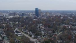 5.7K aerial stock footage of city skyline while passing by neighborhoods, Downtown Lexington, Kentucky Aerial Stock Footage | DX0001_003229
