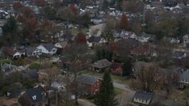 5.7K aerial stock footage of panning across suburban homes and quiet streets in Lexington, Kentucky Aerial Stock Footage | DX0001_003233